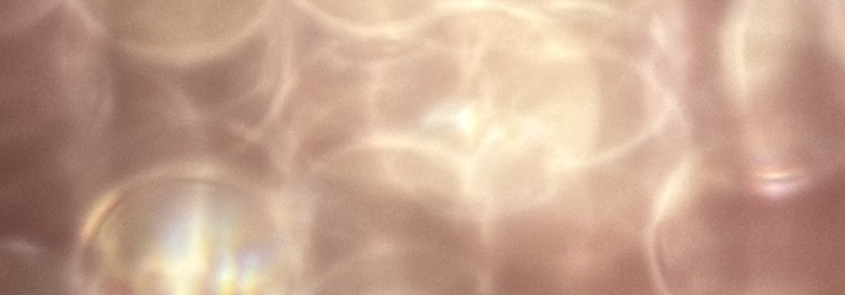obscured view of light with circles and stripes